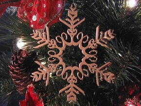 Colin metal snowflake ornament in 14k Gold Plated Brass