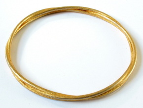 Three loops bangle in Polished Gold Steel