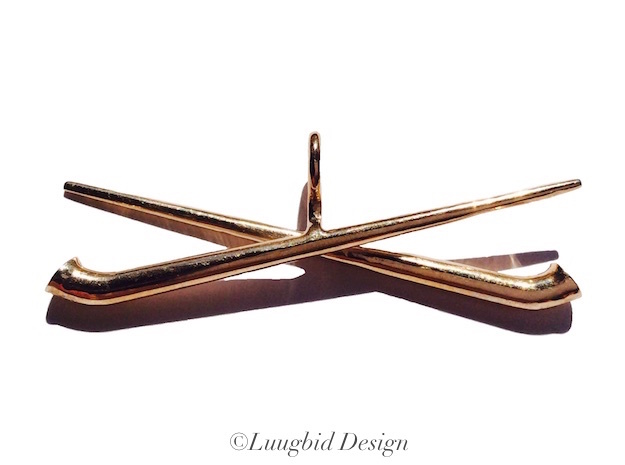 two crossed Alphorn in Polished Bronze