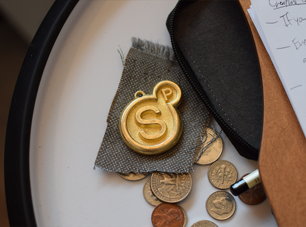 Surreal Products Logo Keychain in Polished Gold Steel
