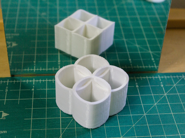 Ambiguous Cylinders : Linking Rings in White Natural Versatile Plastic