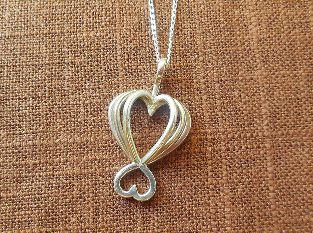 Heart As Open Book Pendant in Polished Silver