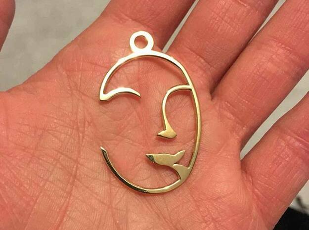 Face Pendant in Polished Brass