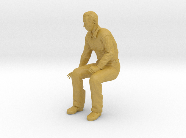 NG Fred sitting on bench looking down in Tan Fine Detail Plastic