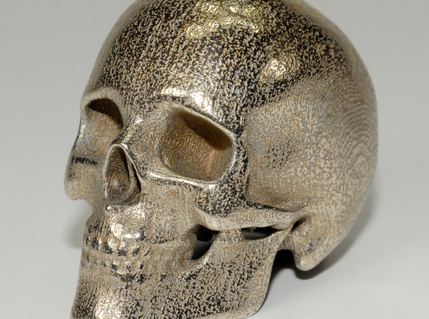 human skull - 5 cm in Polished Bronzed Silver Steel