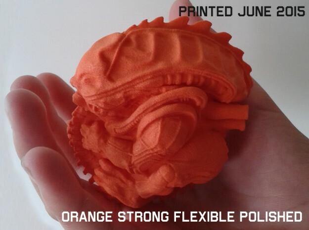 70 MM Alien Fetus in Orange Processed Versatile Plastic