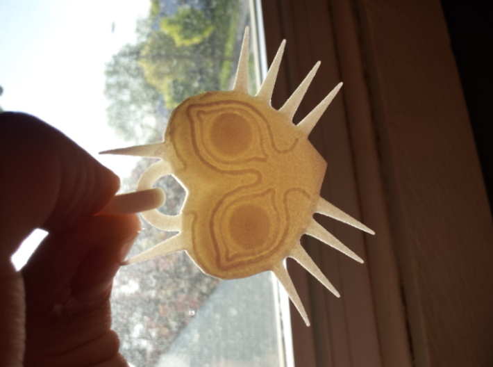 Majoras Mask Pendant 3d printed shown in sunlight for details