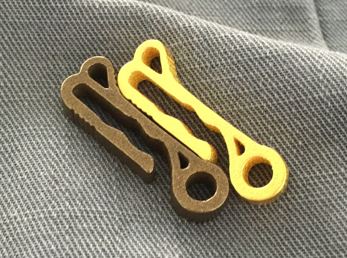 Pocket Clip/Dangler version 2 3d printed In polished bronze and polished gold