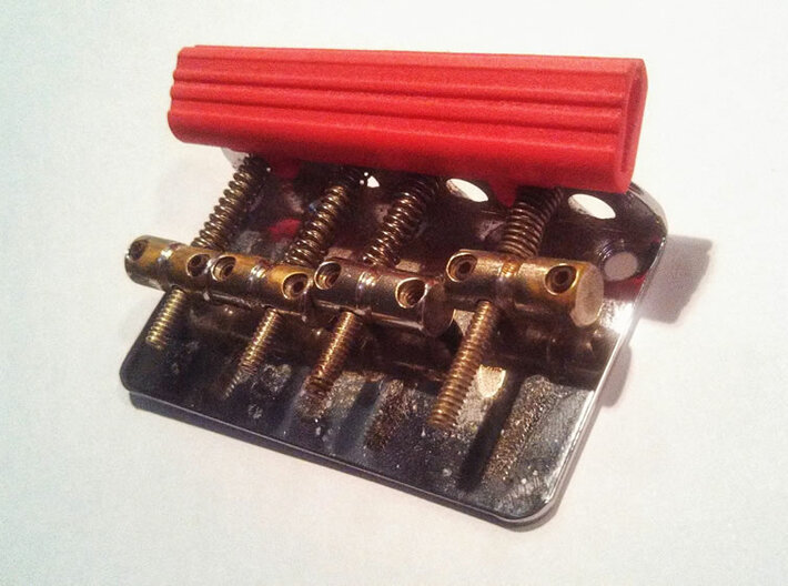 Bridge Pick Holder -fits Stock Fender - Lines 3d printed BPH &quot;Lined&quot; design in Polished Red on a stock Fender bass bridge.