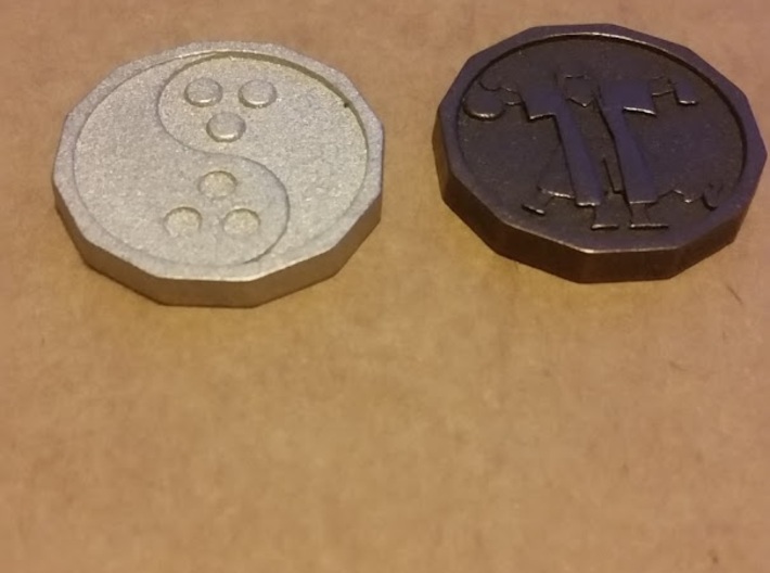 Dudeist Coin Pendant 3d printed Printed in Polished Nickle Steel and Matte Bronze Steel. Quarter is for size reference only, sadly these aren't real currency.
