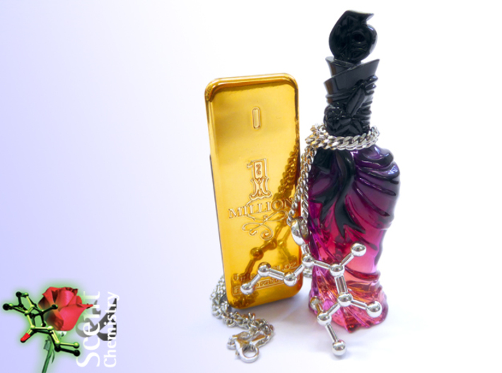 Pomarose 3d printed Pomarose pendant on a rhodinated Oro Vivo SK20259 curb-chain necklace in front of miniatures of '1 Million for men' (Paco Rabanne, 2008) and 'John Galliano for women' (John Galliano, 2008).