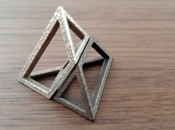 Material Sample - 'Impossible' Pyramid Puzzle Piec 3d printed Here's the solution. The 2 pieces form a tetrahedron (triangular pyramid)