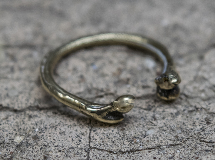 Bone adjustable Ring (Woman size) 3d printed Please note that the ring in the picture is polished
