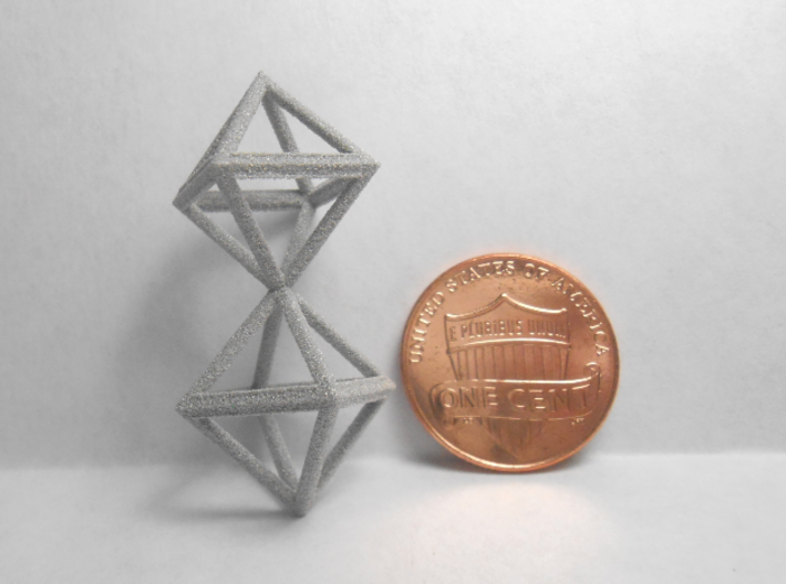 Faceted Twin Octahedron Frame Pendant Small 3d printed Coin scale.
