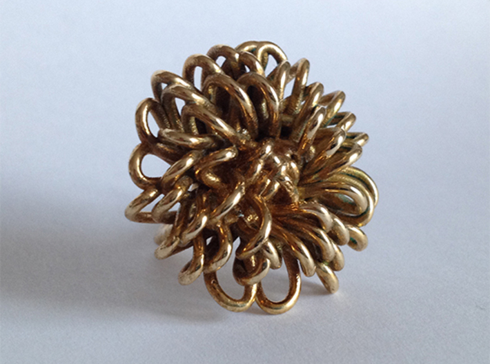 Ring 'Wiener Blume', Size 7.5 (Ø 17.7 mm) 3d printed 3D printed in 'Polished Brass'. Photographed with an Iphone 4S at daylight, no additional filters or lighting. The ring is a few months old and is starting to get a nice antique finish.