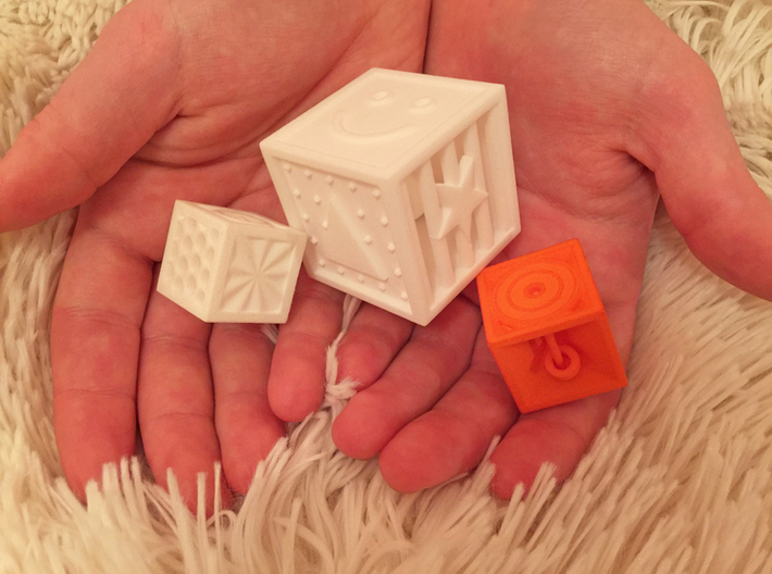 Quadruplets! Tactile Texture Dice, hollow 3d printed a photo comparing 3 of our dice...