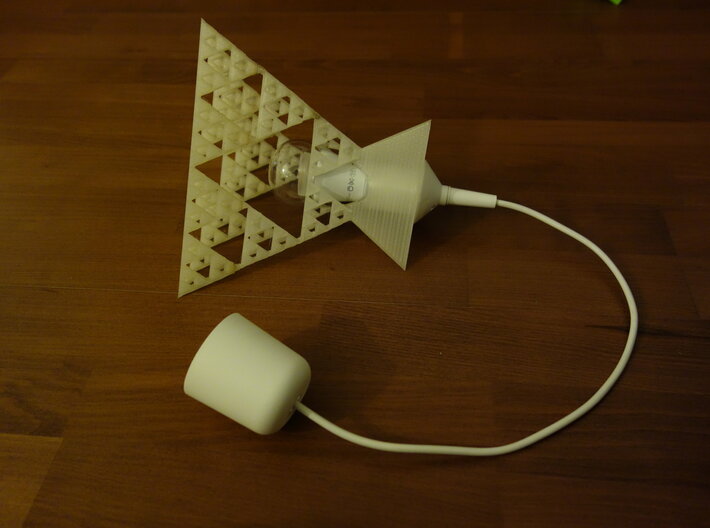 Sierpinski tetrix lamp shade 3d printed with light bulb