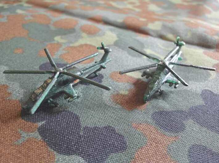 1/300 Chinese WZ-10 Attack Helicopter 3d printed Model in Frosted Ultra Detail (left) and White Strong Flexible (right)