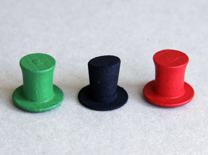 Top Hat Boardgame Counters (x2) 3d printed Showing size compared with the 'Last Will' top hats (the red and green ones).