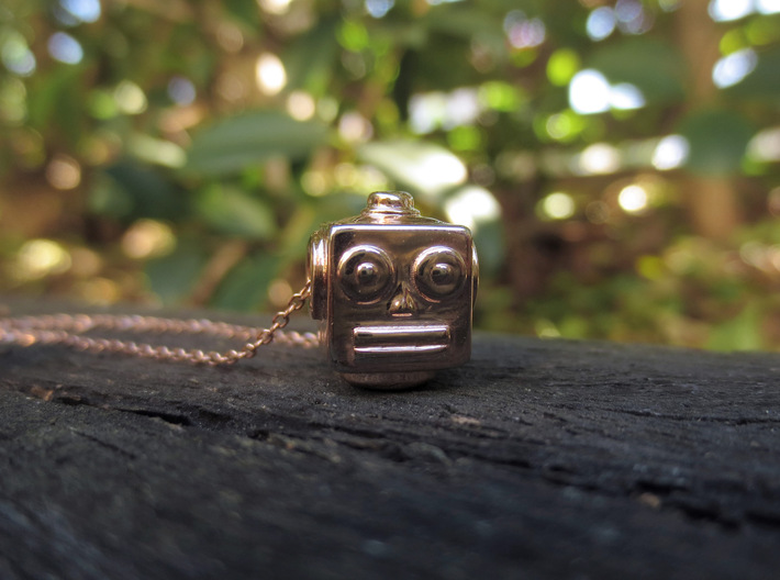 Reversible retro robot head pendant 3d printed Photo of side one
