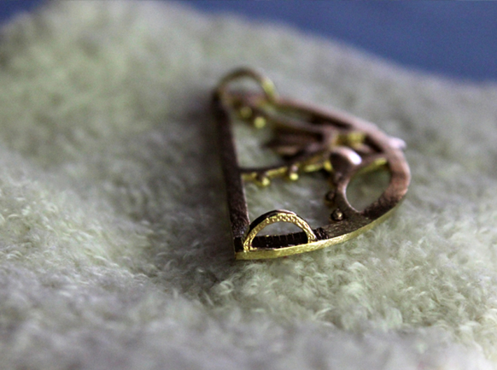 Flora Crescent Pendant 3d printed Product shown is printed in Raw Brass.