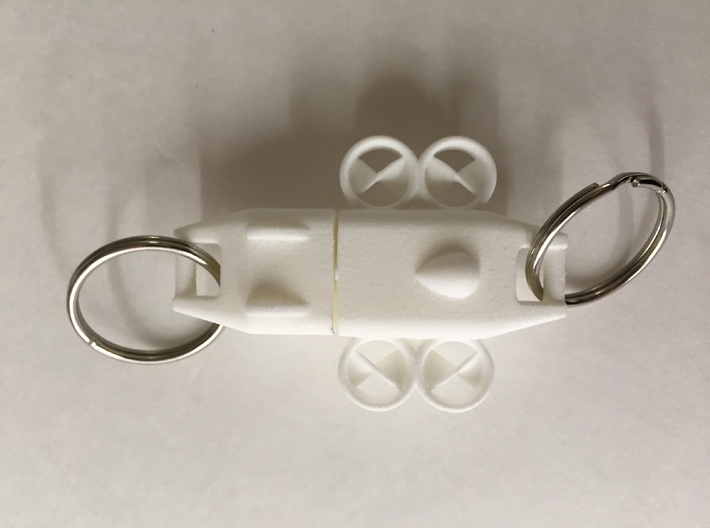 Keychain Ducted Fan Quadcopter 3d printed Picture of White Strong and Flexible with Key Rings (not included).
