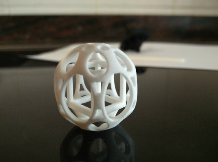 Sphere housing a mobile cube 3d printed Elegant in white