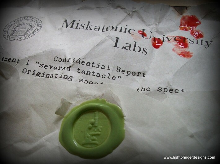 Microscope Wax Seal 3d printed Report from Miskatonic University Labs, for fans of all things H.P. Lovecraft.