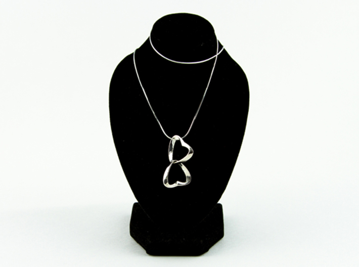 Joined Together - Interlocking Hearts Pendant 3d printed the new interlocking polished Silver