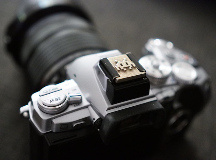Hot Shoe Cover for Cameras, with Space Invaders 3d printed Perfect fit and great looks on a silver Olympus E-M1