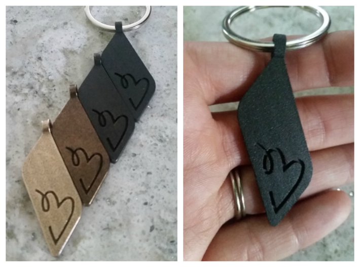Long Heart Pendant 3d printed Shown in Matte Black, Polished Grey, Polished Bronze and Stainless (not available due to color inconsistency)