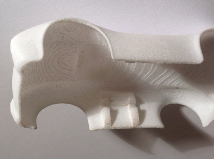HO Slot Car Shell - Fits Aurora AFX/AutoWorld 3d printed As printed before sanding & painting - showing body clip.