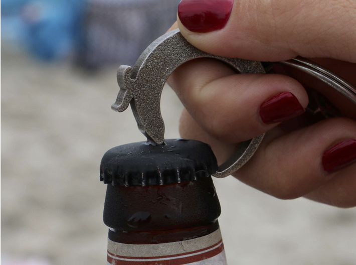Otter Bottle Opener Keychain 3d printed In Action