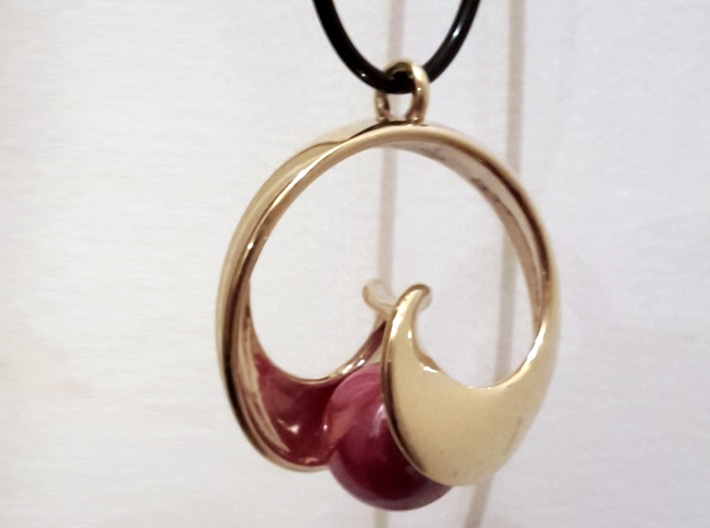 Half Mob-Tor: the half Mobius Torus Shell 3d printed in Gold Plated with a marble and a necklace (non-included)
