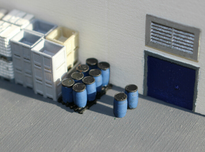 N Scale Blue Barrels 12pc 3d printed Painted barrels at the factory's empties lot, awaiting transport