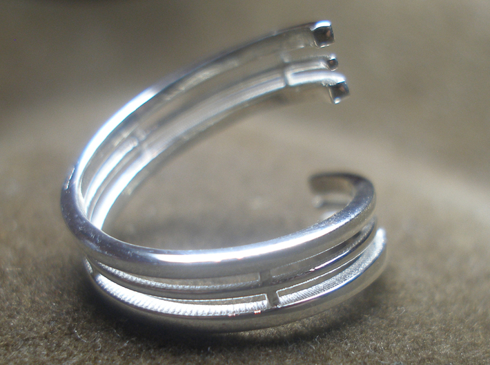 Bars & Wire Ring Size 6 3d printed Photo of the ring from the bottom, printed in sterling silver.