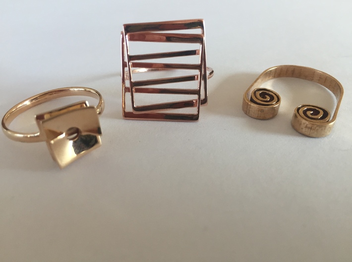 Meet: Intersecting Planes Ring 3d printed Projective Plane Ring in Rose Gold in Center, Front View