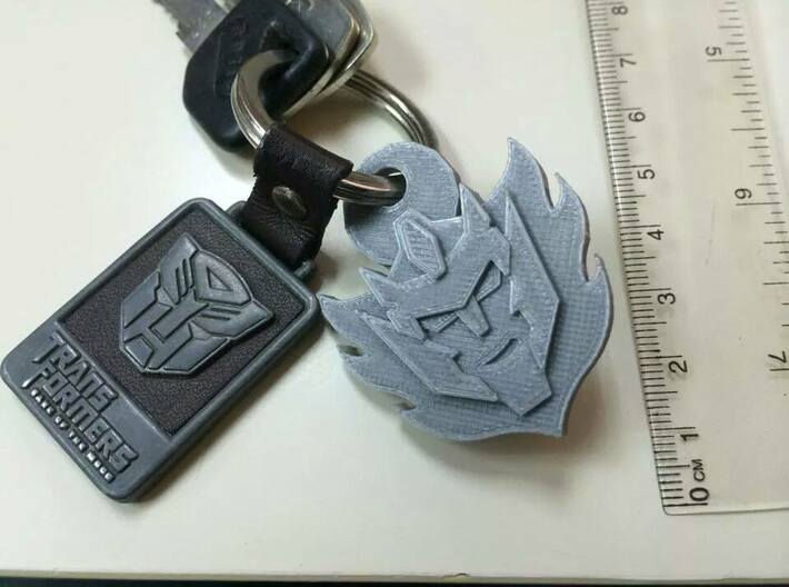 Rodimus Star Keychain 3d printed *note this is printed on my own 3D printer, not a product from Shapeways.