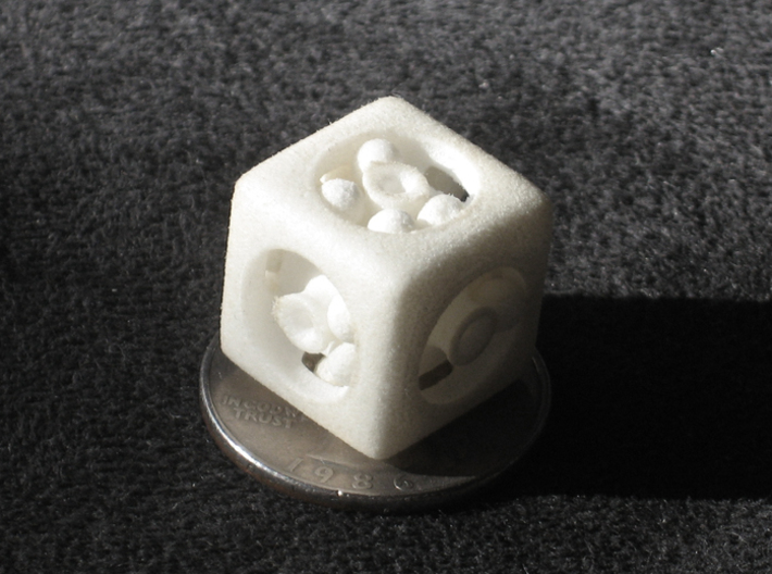 Ball Bearing 6-Sided Die (small) 3d printed White strong and flexible print on a quarter.