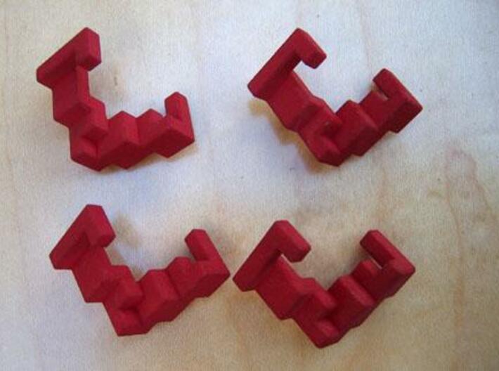 Quad Helix 3d printed The four puzzle pieces.