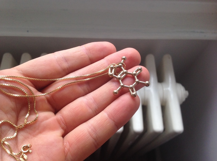Caffeine Molecule Necklace / Keychain 3d printed Caffeine molecule necklace in Raw Brass