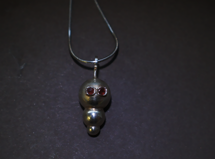 My little Robot 3d printed robot pendant on this picture in silver with two garnets