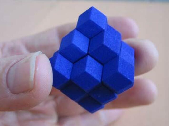 Octahedron with child 3d printed Assembled puzzle in hand.