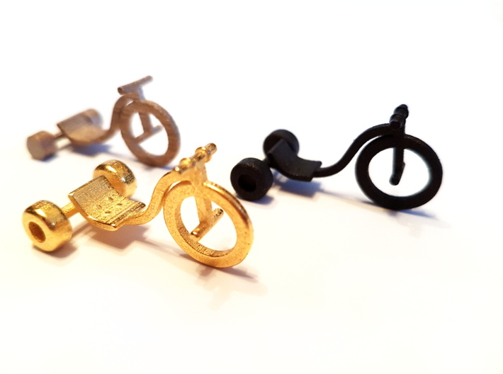 Drift Trike Pendant 3d printed Left to right: Stainless Steel, Polished Gold Steel, Matte Black Steel