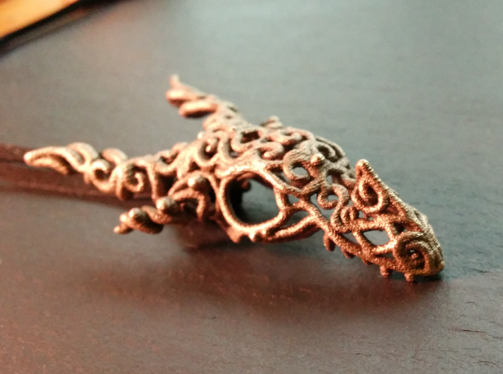 Dragon of Swirls 3d printed Shot in warm light to give a sense of brass/bronze versions.