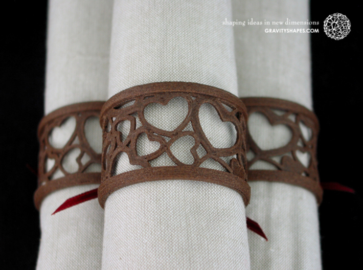 Set of 2 large napkin rings with Hearts 3d printed The photo shows an own print (FDM print) made of brown wood incl. decorative lacing.
