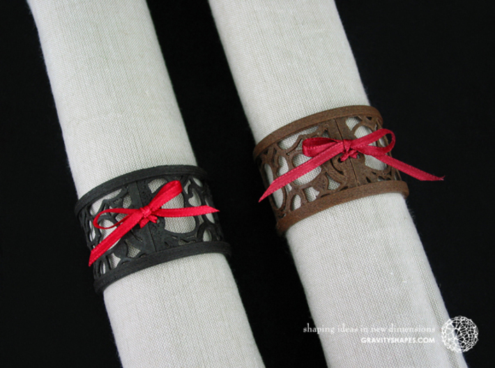 Set of 6 large napkin rings with Hearts 3d printed The photo shows an own print (FDM print) made of brown/black wood incl. decorative lacing.