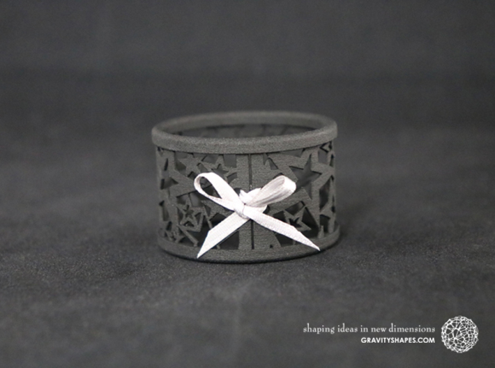 Set of 2 large Christmas napkin rings with Stars 3d printed The photo shows a print made of black strong and flexible incl. silver lacing.