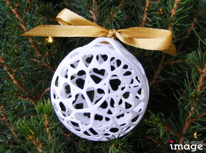 Customizable Christmas Ornament - Snowflakes 3d printed The crossed loop on the top allows you to tie it onto a branch in any direction (different model shown for illustration) 