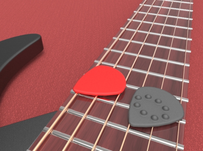 Jazz style thick guitar pick with dimples 3d printed Jazz Style Guitar Pick with Dimples